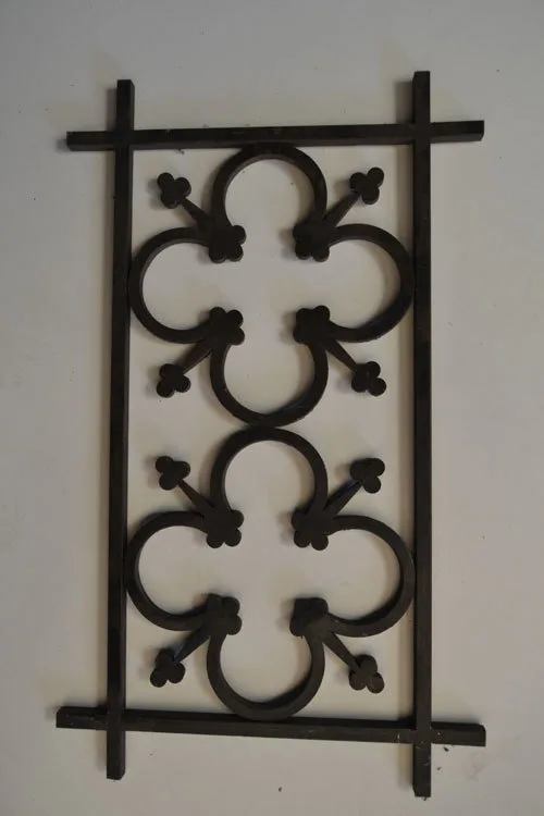 Motif de grille à volutes